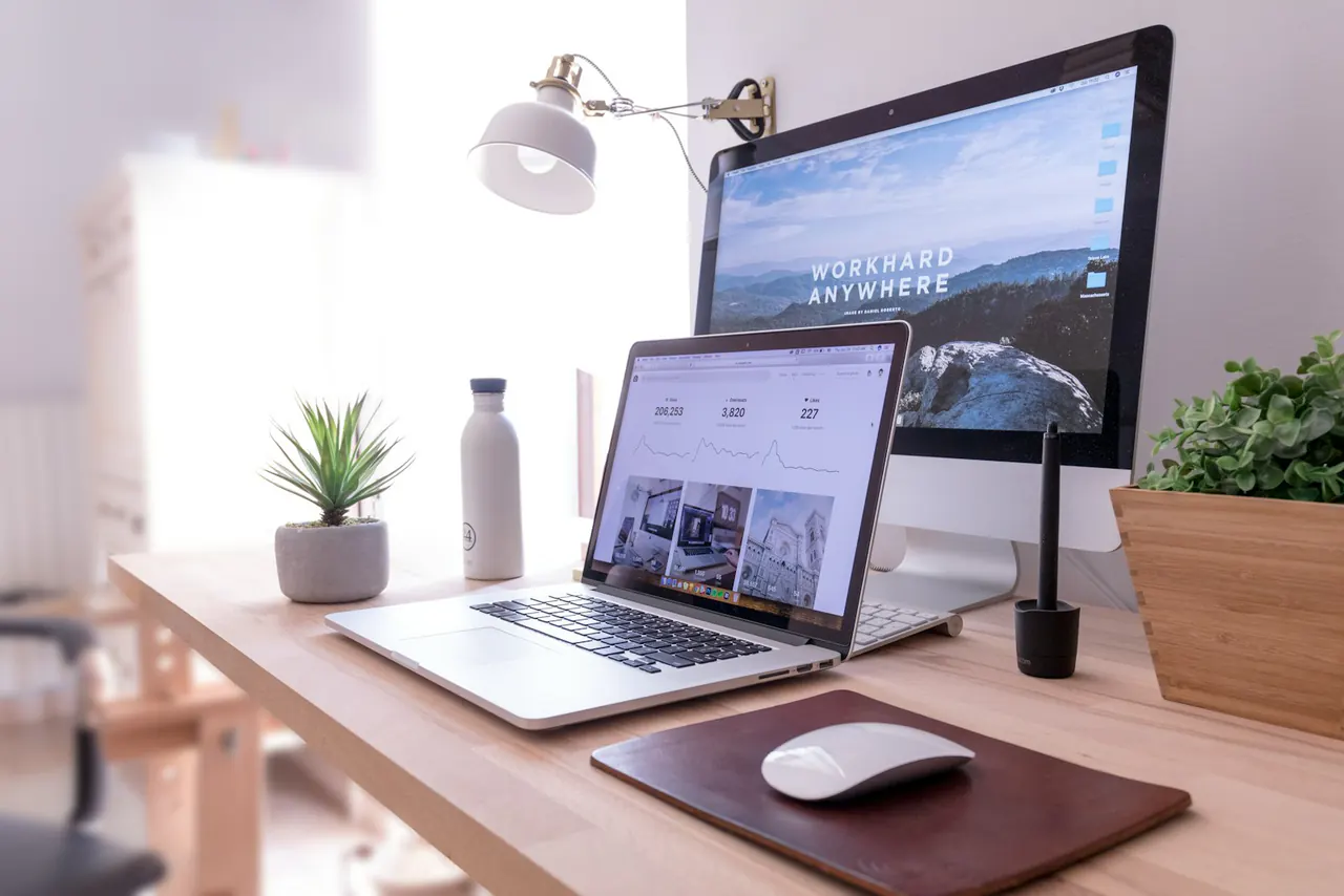 Laptop and workspace used to review digital product information